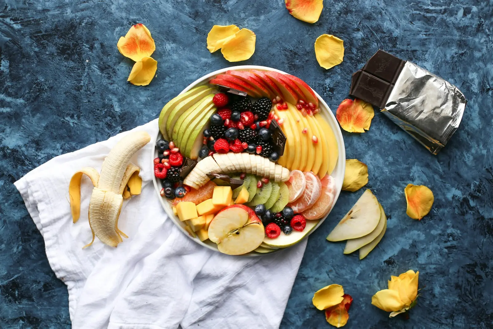 A bowl of fresh fruit and berries